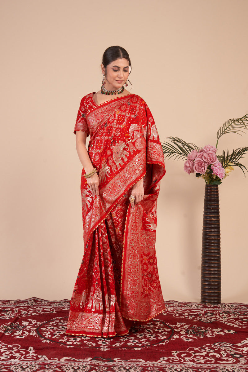 Red woven saree with blouse piece