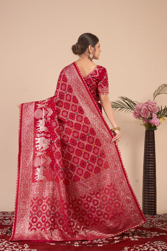 Red woven saree with blouse piece